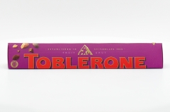 Шоколад швейцарский Toblerone молочный с медово-миндальной нугой с изюмом и орехом 100 гр